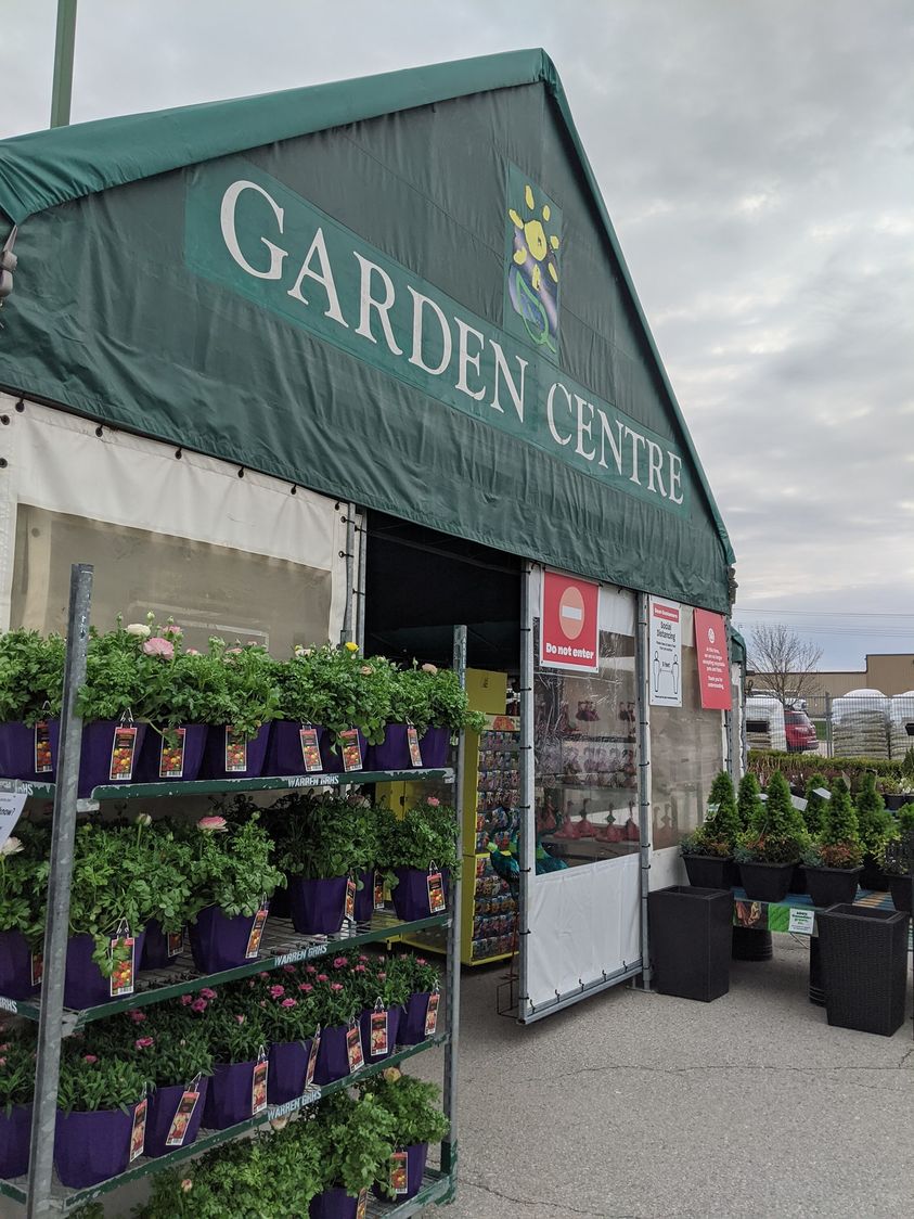 an assembled garden centre stocked with plants ready for sale